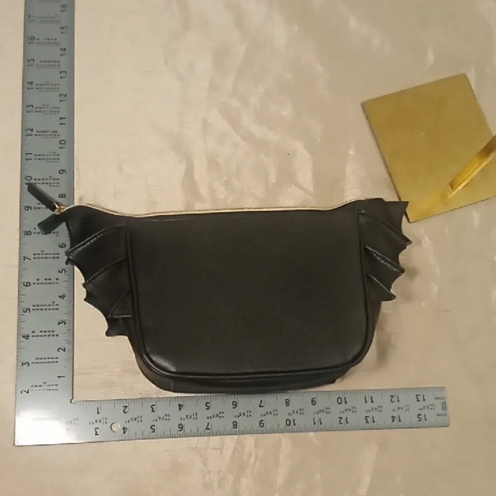 Black Bat Wing Crossbody Bag with Orange Star